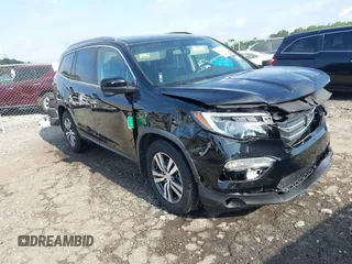 2018 Honda Pilot EX-L with VIN 5FNYF5H54JB001668, listed as a IAAI auction lot 42293857 with 60,076 mi miles and . Bid and sale history available at DreamBid. Image 1.
