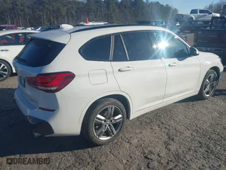2021 BMW X1 xDrive28i with VIN WBXJG9C04M5S84454, listed as a IAAI auction lot 41373515 with 45,030 mi miles. Bid and sale history available at carsss.com. Image 4.