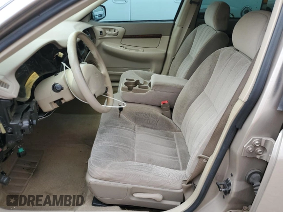 2002 Chevrolet Impala with VIN 2G1WF52E729172025, listed as a Copart auction lot 64854335 with 97,510 mi miles and Salvage title. Bid and sale history available at DreamBid. Image 7.