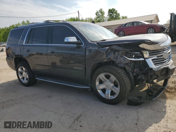 2015 Chevrolet Tahoe LTZ z VIN 1GNSKCKC4FR626030, wystawiony jako Copart lot #56280805 z przebiegiem Nie podano mil oraz Szkoda całkowita • Salvage title. Historia ofert i sprzedaży dostępna na DreamBid. Obrazek 4.
