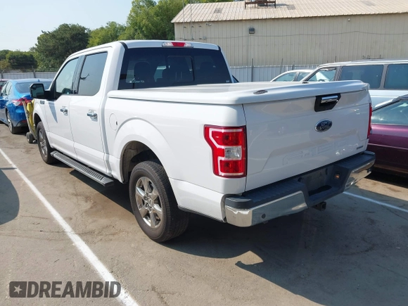 2019 Ford F-150 XL with VIN 1FTEW1C44KKC60773, listed as a IAAI auction lot 42706042 with 185,864 mi miles and . Bid and sale history available at DreamBid. Image 3.