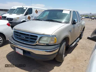 2000 Ford F-150 XL with VIN 1FTRX07W6YKB19703, listed as a IAAI auction lot 42375355 with Not provided miles and . Bid and sale history available at DreamBid. Image 2.