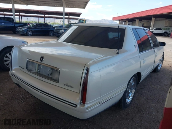 1999 Cadillac DeVille z VIN 1G6KD54YXXU794294, wystawiony jako IAAI lot #42141931 z przebiegiem 161 408 mil mil oraz . Historia ofert i sprzedaży dostępna na DreamBid. Obrazek 4.