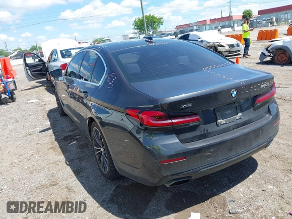 2021 BMW 5 Series 540i xDrive with VIN WBA73BJ02MWW93833, listed as a IAAI auction lot 42160043 with 59,779 mi miles and . Bid and sale history available at DreamBid. Image 3.