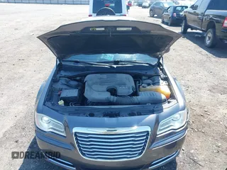 2014 Chrysler 300 with VIN 2C3CCAAG3EH237157, listed as a IAAI auction lot 41986053 with 61,372 mi miles and . Bid and sale history available at DreamBid. Image 10.