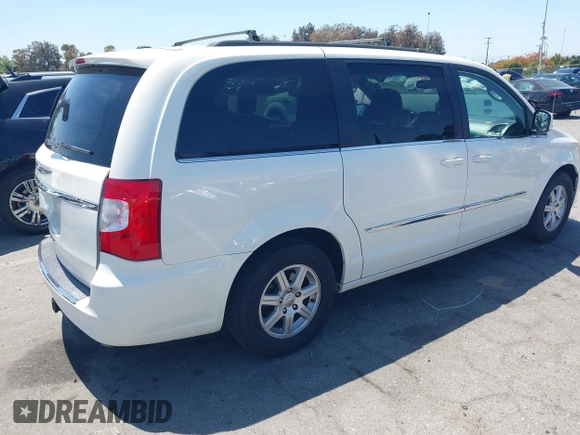 2012 Chrysler Town & Country Touring with VIN 2C4RC1BG5CR291815, listed as a IAAI auction lot 42147129 with 167,982 mi miles and . Bid and sale history available at DreamBid. Image 4.