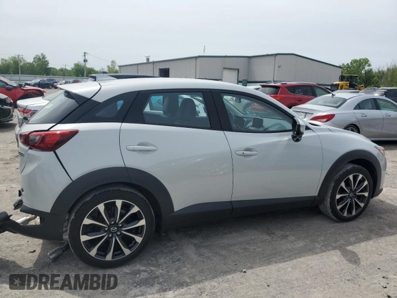 2019 Mazda CX-3 Touring z VIN JM1DKFC76K1451342, wystawiony jako Copart lot #58413935 z przebiegiem 21 391 mil mil oraz Szkoda całkowita • Salvage title. Historia ofert i sprzedaży dostępna na DreamBid. Obrazek 3.
