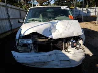 2000 Chevrolet Astro with VIN 1GNDM19W8YB158337, listed as a Copart auction lot 77418574 with Not Provided miles and Salvage Title. Bid and sale history available at carsss.com. Image 5.