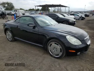 2002 Lexus SC 430 with VIN JTHFN48YX20007150, listed as a Copart auction lot 57253434 with 130,029 mi miles and Salvage Title. Bid and sale history available at DreamBid. Image 4.