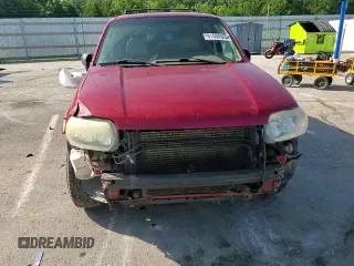 2006 Ford Escape Limited with VIN 1FMYU04116KA40963, listed as a Copart auction lot 61600525 with 208,696 mi miles and Salvage title. Bid and sale history available at DreamBid. Image 15.