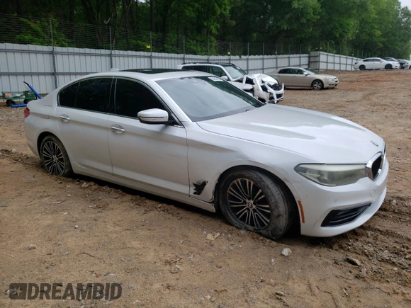 2018 BMW 5 Series 530i with VIN WBAJA5C53JG898430, listed as a Copart auction lot 54243195 with 129,854 mi miles and Salvage title. Bid and sale history available at DreamBid. Image 4.