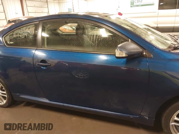 2009 Scion tC with VIN JTKDE167990297921, listed as a IAAI auction lot 41720687 with 159,960 mi miles. Bid and sale history available at carsss.com. Image 14.