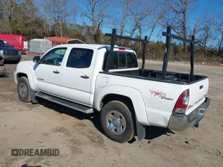 2009 Toyota Tacoma PreRunner with VIN 3TMJU62N79M078810, listed as a IAAI auction lot 41358051 with 154,001 mi miles. Bid and sale history available at carsss.com. Image 3.
