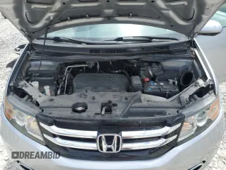 2015 Honda Odyssey Touring Elite z VIN 5FNRL5H93FB041067, wystawiony jako Copart lot #58329355 z przebiegiem 72 000 mil mil oraz Szkoda całkowita • Salvage title. Historia ofert i sprzedaży dostępna na DreamBid. Obrazek 12.