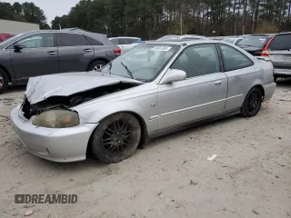 1999 Honda Civic EX with VIN 1HGEJ8144XL022418, listed as a Copart auction lot 80667884 with 147,471 mi miles and Salvage Title. Bid and sale history available at carsss.com. Image 1.