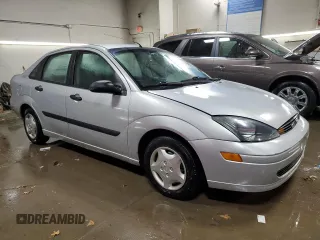 2003 Ford Focus LX z VIN 1FAFP33P03W313279, wystawiony jako Copart lot #89271495 z przebiegiem 152 672 mil mil oraz Szkoda całkowita • Salvage title. Historia ofert i sprzedaży dostępna na DreamBid. Obrazek 4.