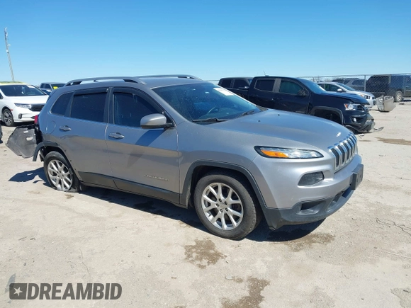 2016 Jeep Cherokee 75th Anniversary with VIN 1C4PJLCB1GW217638, listed as a IAAI auction lot 41689623 with 124,630 mi miles and . Bid and sale history available at DreamBid. Image 1.