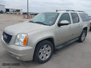 2013 GMC Yukon XL SLT with VIN 1GKS1KE02DR330318, listed as a IAAI auction lot 41526110 with 187,699 mi miles. Bid and sale history available at carsss.com. Image 2.