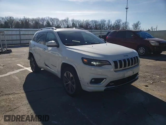 2019 Jeep Cherokee Overland with VIN 1C4PJMJN3KD173830, listed as a Copart auction lot 87229794 with 82,433 mi miles and Salvage title. Bid and sale history available at DreamBid. Image 12.
