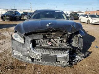 2014 Jaguar XJ Portfolio with VIN SAJWJ2GD6E8V73491, listed as a Copart auction lot 42472345 with 68,747 mi miles and Salvage title. Bid and sale history available at DreamBid. Image 5.