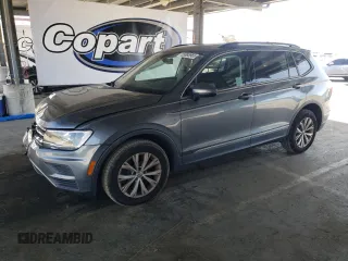 2018 Volkswagen Tiguan SEL z VIN 3VV3B7AX8JM125307, wystawiony jako Copart lot #55888965 z przebiegiem 68 123 mil mil oraz Szkoda całkowita • Salvage title. Historia ofert i sprzedaży dostępna na DreamBid. Obrazek 1.