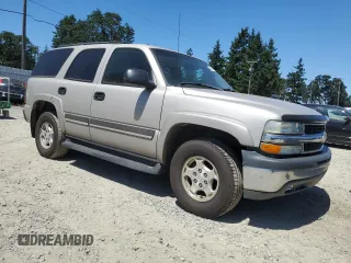 2004 Chevrolet Tahoe LS with VIN 1GNEC13V24J321605, listed as a Copart auction lot 64476065 with 176,551 mi miles and Salvage title. Bid and sale history available at DreamBid. Image 4.