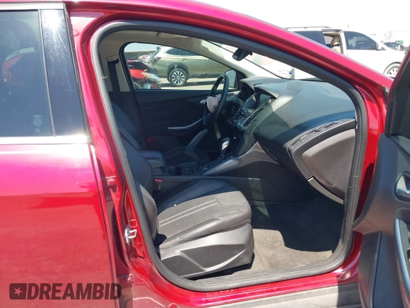 2013 Ford Focus Titanium with VIN 1FADP3J23DL334161, listed as a IAAI auction lot 41987758 with 117,665 mi miles and . Bid and sale history available at carsss.com. Image 5.