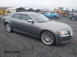 2011 Chrysler 300 with VIN 2C3CA6CT8BH547555, listed as a IAAI auction lot 41858626 with 141,853 mi miles. Bid and sale history available at carsss.com. Image 1.