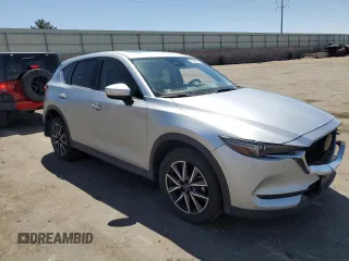 2018 Mazda CX-5 Grand Touring with VIN JM3KFBDM3J0319157, listed as a Copart auction lot 53891095 with 133,189 mi miles and Salvage Title. Bid and sale history available at DreamBid. Image 4.