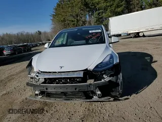 2023 Tesla Model Y Long Range z VIN 7SAYGDEE5PF619265, wystawiony jako Copart lot #48418655 z przebiegiem 42 233 mil mil oraz Szkoda całkowita • Salvage title. Historia ofert i sprzedaży dostępna na DreamBid. Obrazek 12.