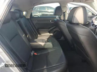 2024 Honda Civic EX-L z VIN 19XFL1H73RE004153, wystawiony jako Copart lot #56208225 z przebiegiem 23 962 mil mil oraz Szkoda całkowita • Salvage title. Historia ofert i sprzedaży dostępna na DreamBid. Obrazek 10.