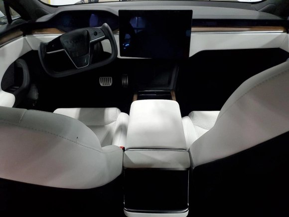 2023 Tesla Model S с VIN 5YJSA1E5XPF500758, выставлен на аукционе Copart как лот 51654685 с пробегом 25 390 миль миль и Списание • Salvage title. История ставок и продаж доступна на DreamBid. Изображение 8.
