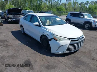 2015 Toyota Camry XLE with VIN 4T1BF1FK6FU948938, listed as a IAAI auction lot 42023487 with 107,232 mi miles. Bid and sale history available at carsss.com. Image 1.