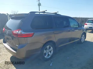 2016 Toyota Sienna LE AAS with VIN 5TDKK3DC3GS765784, listed as a IAAI auction lot 41759100 with 119,218 mi miles. Bid and sale history available at carsss.com. Image 4.