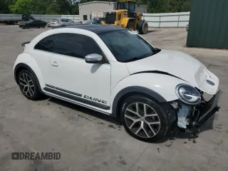2017 Volkswagen Beetle Dune с VIN 3VWS17AT4HM628723, выставлен на аукционе Copart как лот 54303445 с пробегом 138 254 миль миль и Списание • Salvage title. История ставок и продаж доступна на DreamBid. Изображение 4.