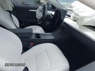 2023 Tesla Model 3 z VIN 5YJ3E1EA5PF383595, wystawiony jako IAAI lot #41965562 z przebiegiem 35 878 mil mil oraz . Historia ofert i sprzedaży dostępna na DreamBid. Obrazek 5.