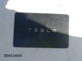 2023 Tesla Model Y Long Range z VIN 7SAYGAEE4PF945847, wystawiony jako IAAI lot #41071924 z przebiegiem 33 454 mil mil oraz . Historia ofert i sprzedaży dostępna na DreamBid. Obrazek 11.