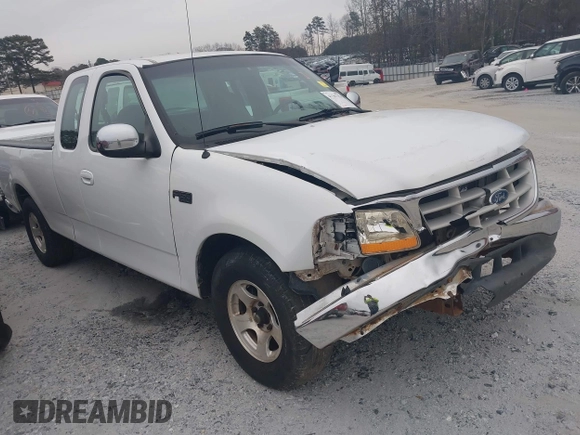 1999 Ford F-150 with VIN 1FTZX1728XNA81813, listed as a IAAI auction lot 41367154 with 149,103 mi miles and . Bid and sale history available at DreamBid. Image 1.