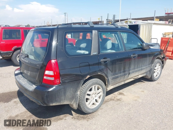 2003 Subaru Forester XS with VIN JF1SG65633H730386, listed as a IAAI auction lot 42084706 with 199,602 mi miles. Bid and sale history available at carsss.com. Image 4.