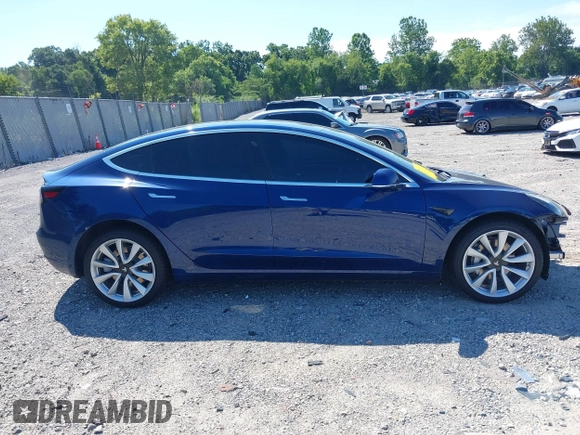 2019 Tesla Model 3 Mid Range with VIN 5YJ3E1EA6KF402308, listed as a IAAI auction lot 40077902 with 89,794 mi miles and . Bid and sale history available at carsss.com. Image 13.