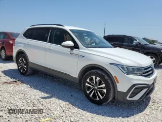 2022 Volkswagen Tiguan S with VIN 3VV1B7AXXNM011256, listed as a Copart auction lot 52536495 with 113,479 mi miles and Clean title. Bid and sale history available at DreamBid. Image 4.