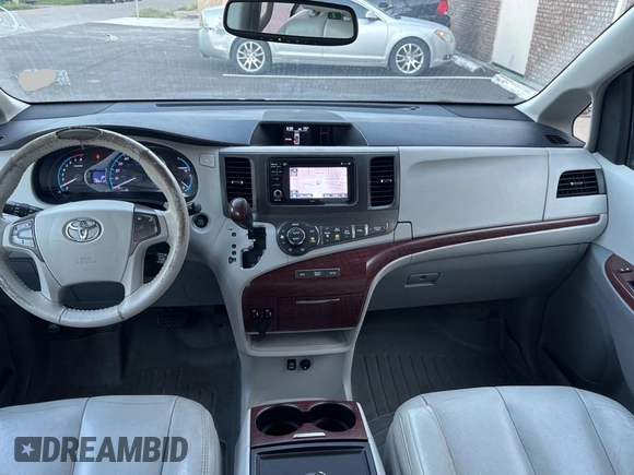 2013 Toyota Sienna XLE AAS with VIN 5TDYK3DC6DS398059, listed as a Copart auction lot 56074325 with 186,212 mi miles and Clean Title. Bid and sale history available at DreamBid. Image 9.