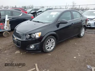 2012 Chevrolet Sonic LT with VIN 1G1JC5SH0C4129096, listed as a IAAI auction lot 42023621 with 45,517 mi miles and . Bid and sale history available at DreamBid. Image 2.