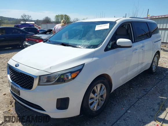 2016 Kia Sedona LX with VIN KNDMB5C1XG6094649, listed as a IAAI auction lot 41883433 with 120,038 mi miles. Bid and sale history available at carsss.com. Image 17.