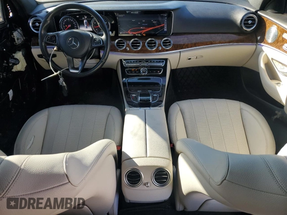 2017 Mercedes-Benz E 300 Luxury with VIN WDDZF4KB9HA013675, listed as a Copart auction lot 89335225 with 69,128 mi miles and Salvage title. Bid and sale history available at DreamBid. Image 8.
