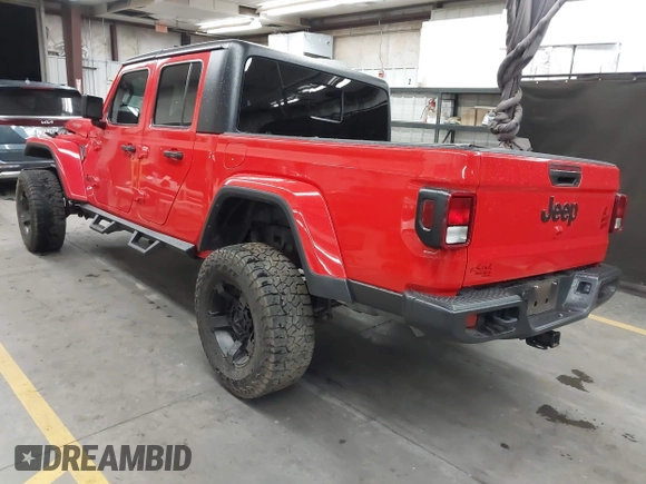 2022 Jeep Gladiator Altitude z VIN 1C6HJTAGXNL117353, wystawiony jako IAAI lot #42427921 z przebiegiem 28 801 mil mil oraz . Historia ofert i sprzedaży dostępna na DreamBid. Obrazek 3.