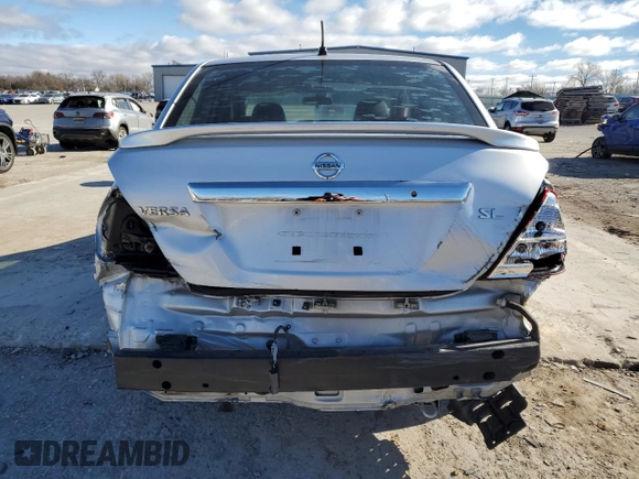 2009 Nissan Versa 1.8 S with VIN 3N1BC11E29L372166, listed as a Copart auction lot 86772944 with 0 mi miles and Salvage Title. Bid and sale history available at carsss.com. Image 6.
