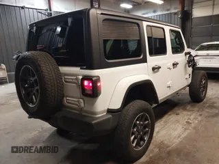 2021 Jeep Wrangler Unlimited Freedom with VIN 1C4HJXDNXMW681267, listed as a IAAI auction lot 42026181 with 40,143 mi miles and . Bid and sale history available at DreamBid. Image 4.