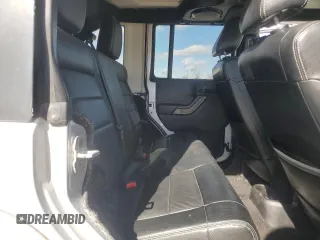 2012 Jeep Wrangler Unlimited Altitude z VIN 1C4HJWEG3CL169991, wystawiony jako Copart lot #45489175 z przebiegiem Nie podano mil oraz Szkoda całkowita • Salvage title. Historia ofert i sprzedaży dostępna na DreamBid. Obrazek 11.