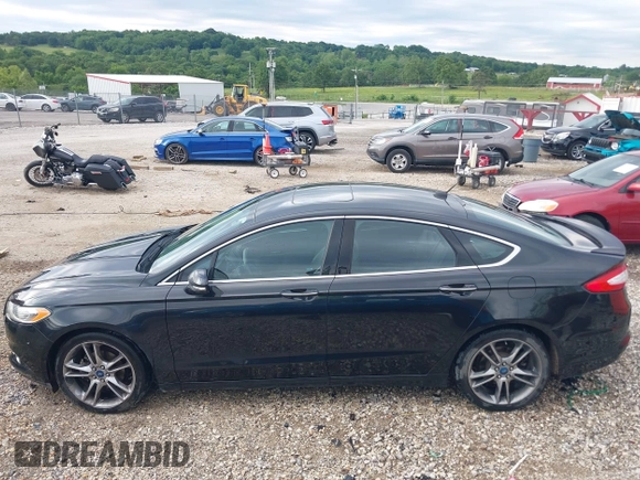 2013 Ford Fusion Titanium with VIN 3FA6P0K95DR153437, listed as a IAAI auction lot 42334754 with 139,623 mi miles and . Bid and sale history available at DreamBid. Image 14.